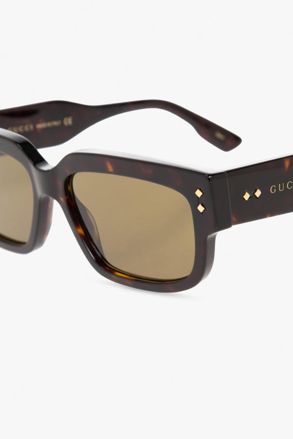 Gucci sunglasses Valerian boast a classic square silhouette and are finished in red tones