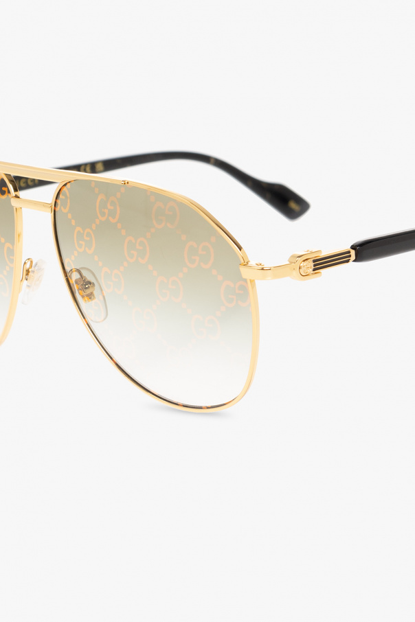 Gucci round-frame sunglasses with logo