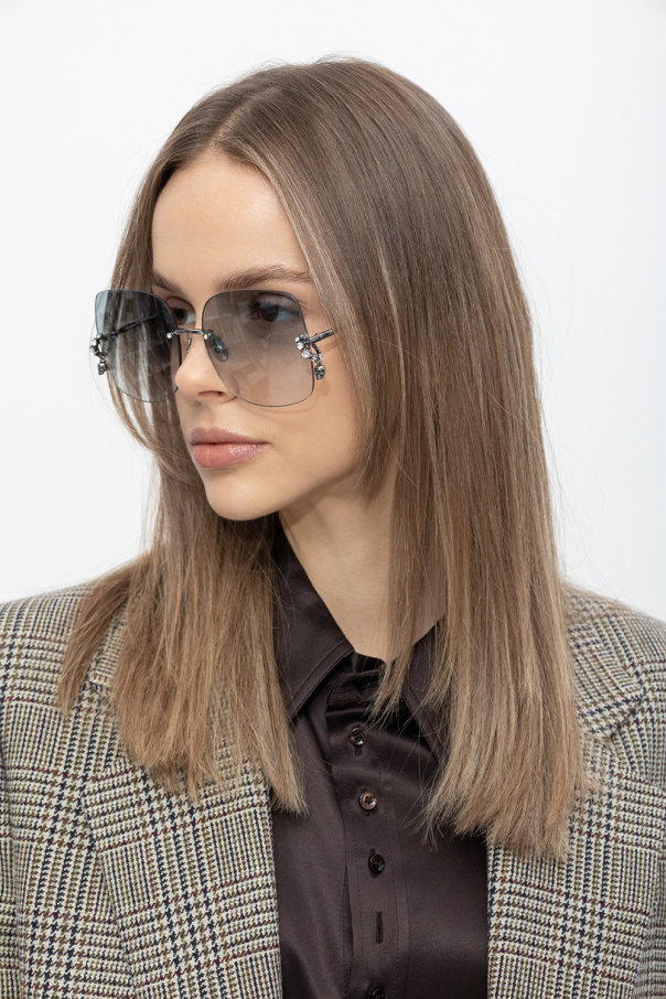 Alexander McQueen cut-out angled rose-tinted sunglasses