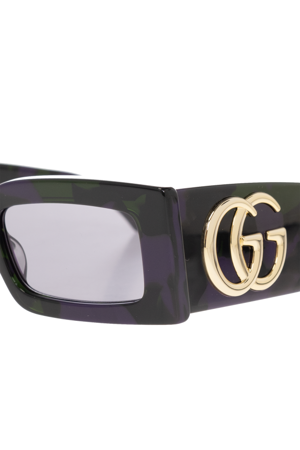 Gucci These sunglasses mask-frame come with either a black