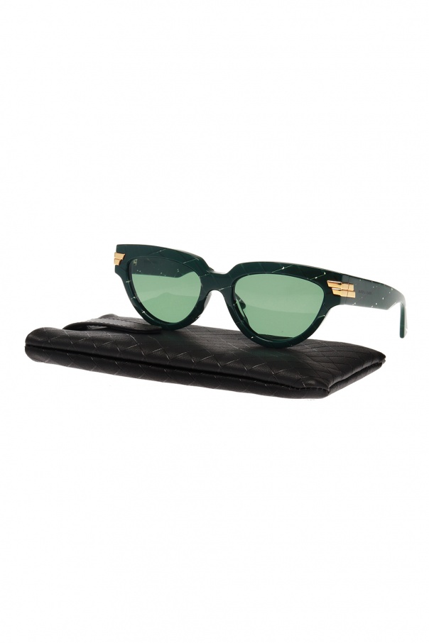 Bottega Veneta oakley latch sunglasses feature a built in hang clip