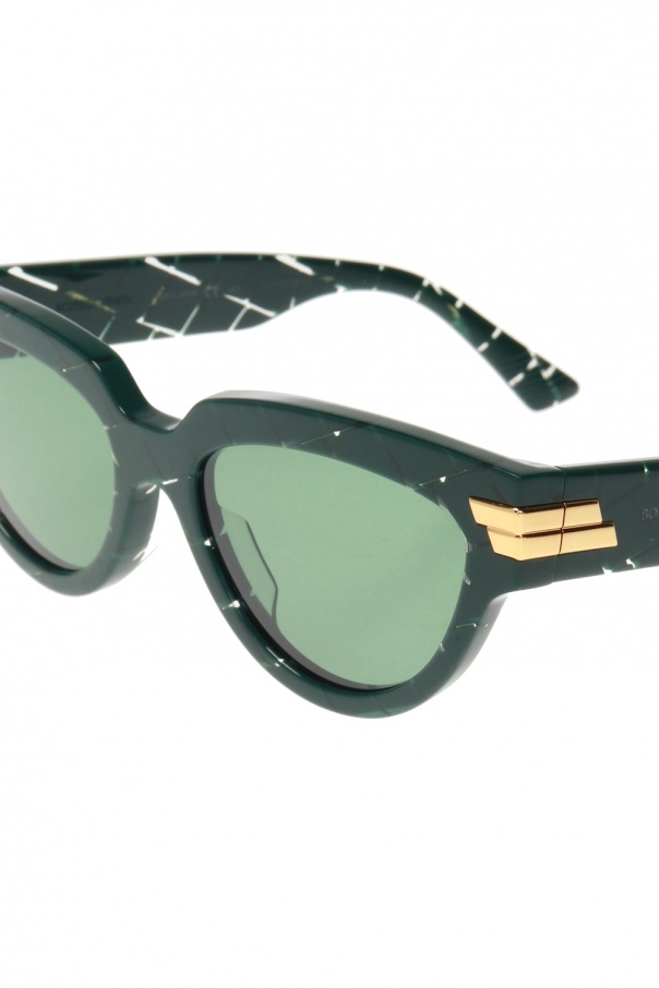 Bottega Veneta oakley latch sunglasses feature a built in hang clip