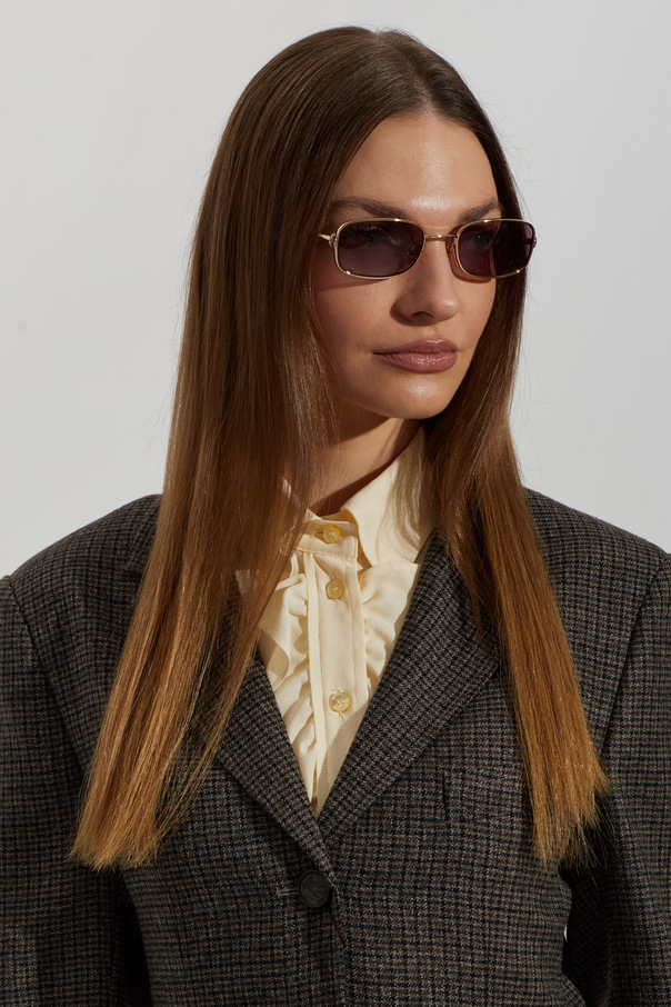 Etro Gafas de sol de Etro con montura metálica dorada y lentes ahumadas