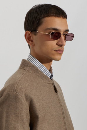 Etro Gafas de sol de Etro con montura metálica dorada y lentes ahumadas
