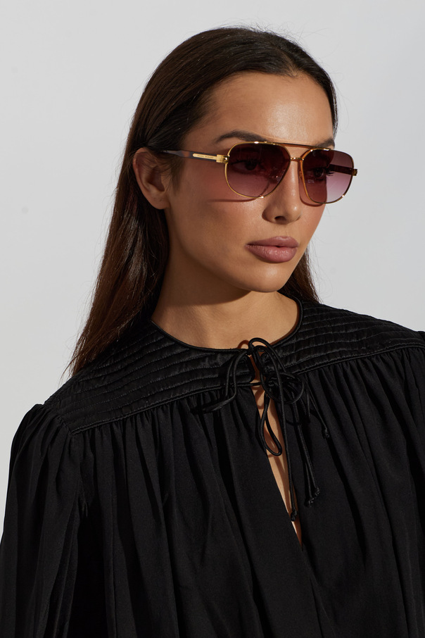 Isabel Marant Gafas de sol de Isabel Marant con montura dorada de gran tamaño y diseño cuadrado-aviador