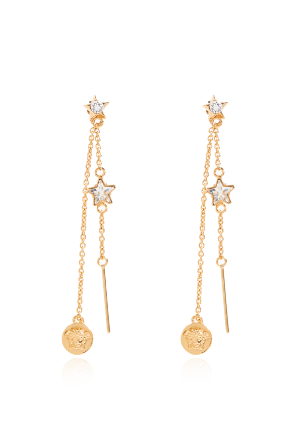 Long earrings with shimmering crystals od Versace