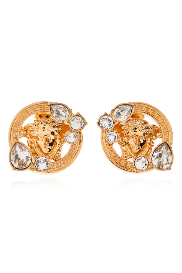 Earrings with shimmering crystals od Versace