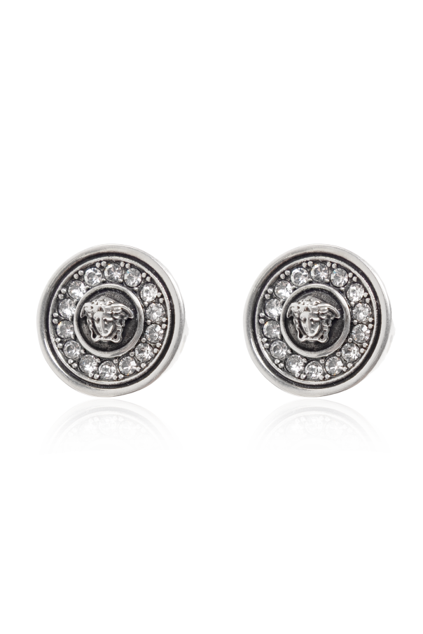 Earrings with shimmering crystals od Versace