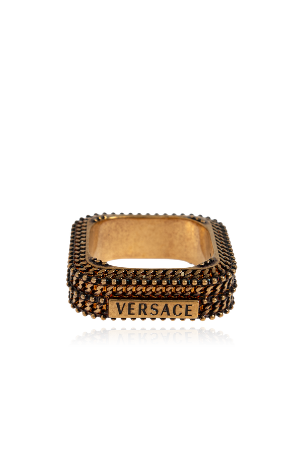 Brass ring with logo od Versace