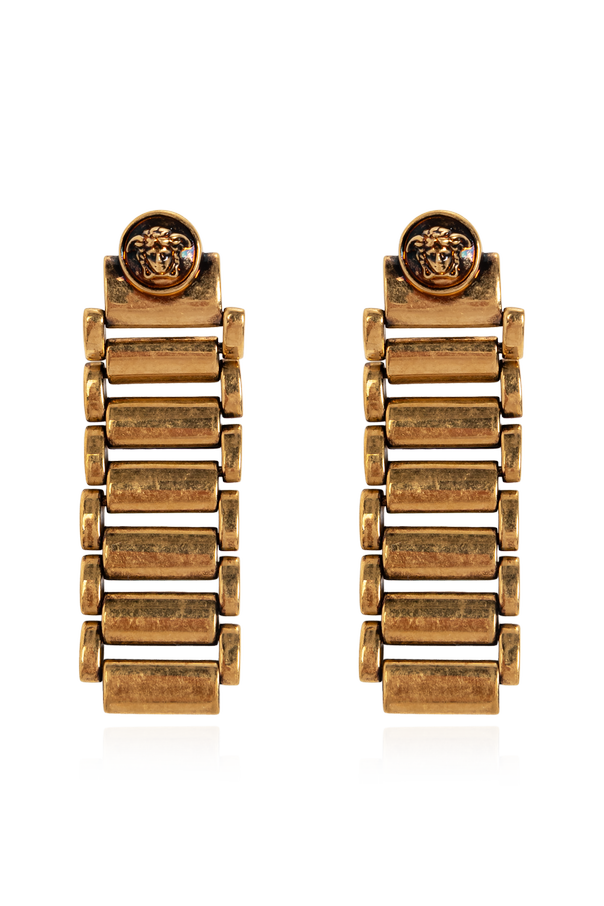 Brass earrings with a Medusa head od Versace