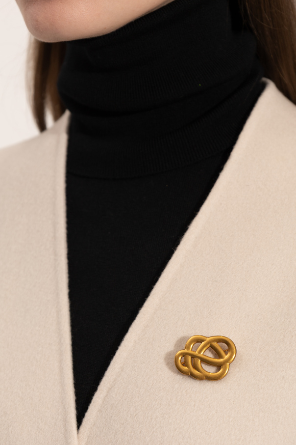 By Malene Birger Brooch in the shape of a logo