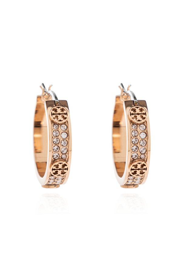 Round earrings with shimmering crystals od Tory Burch