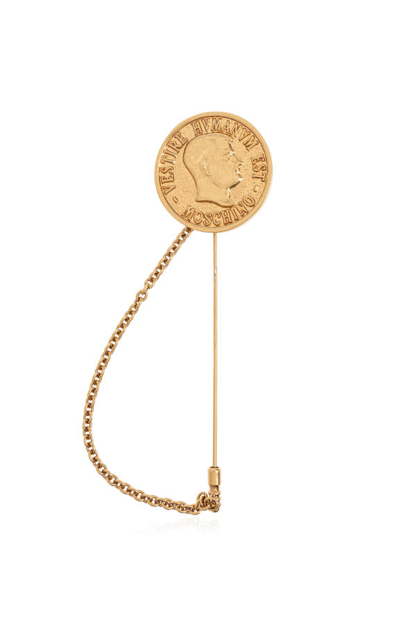 Brooch in the shape of a coin od Moschino