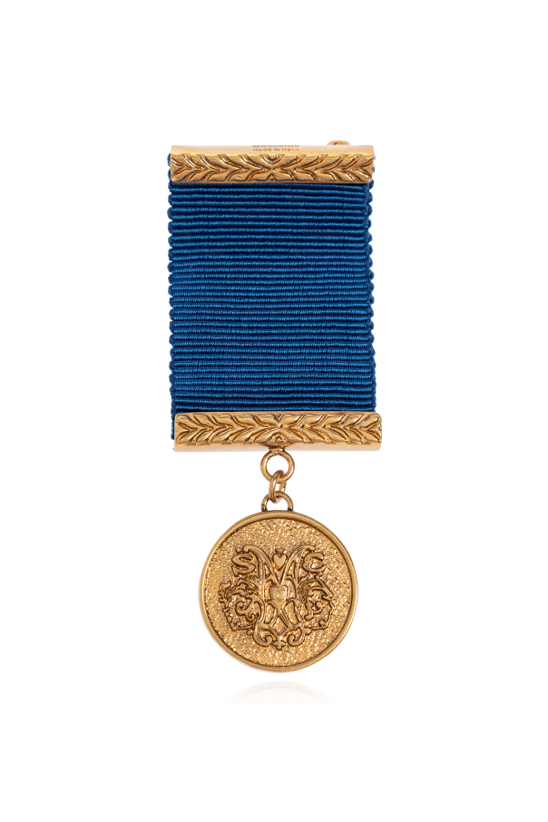 Brooch with pendant od Moschino