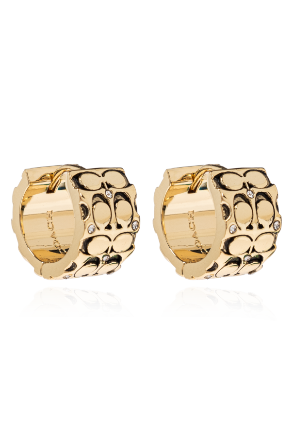 Earrings with engraved logo od Coach