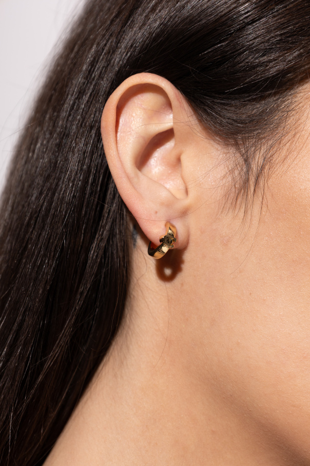 Coach Pendientes de latón