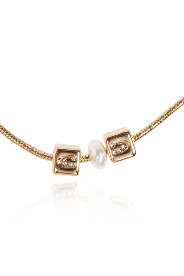 Coach Pulsera con dijes