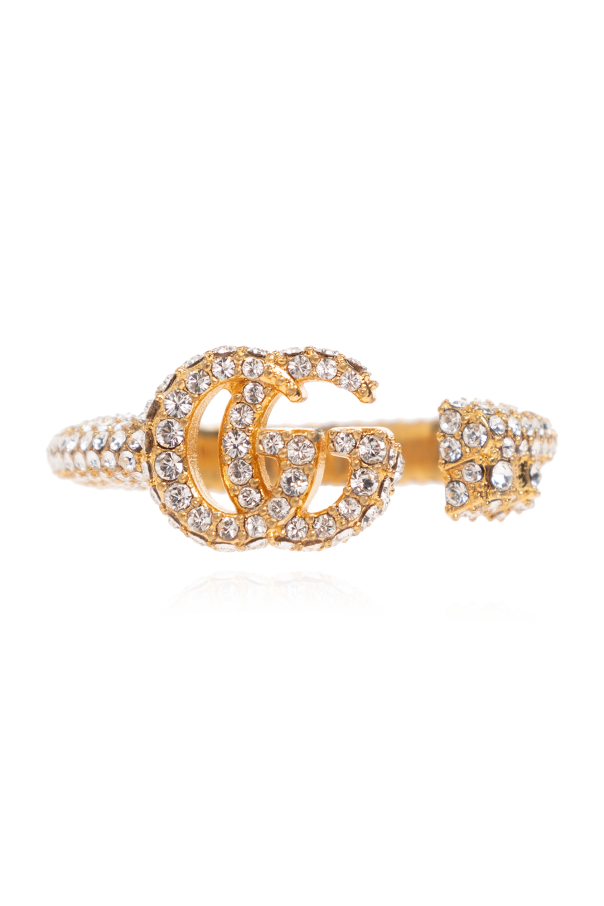 Crystal-encrusted ring od Gucci