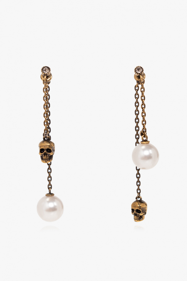 Brass earrings od Alexander McQueen