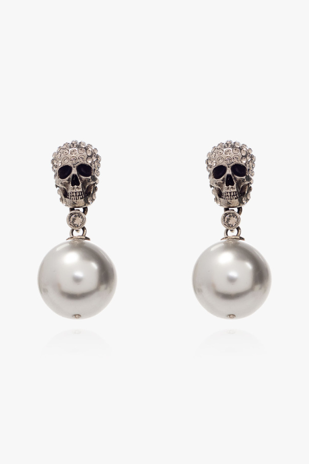 Brass earrings od Alexander McQueen