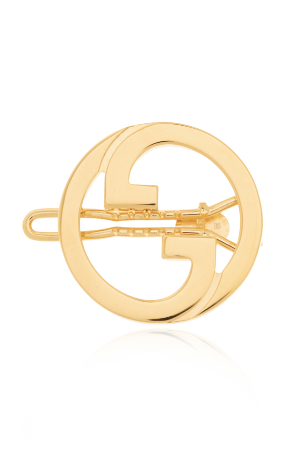 Brass hair clip od Gucci