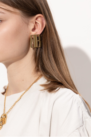Brass earrings od Balenciaga