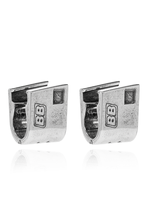 Brass earrings od Balenciaga