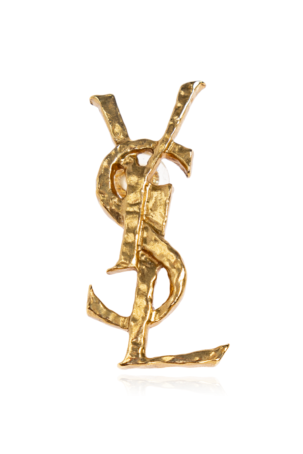 Brass clip in the shape of a logo od Saint Laurent