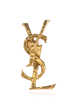 Brass clip in the shape of a logo