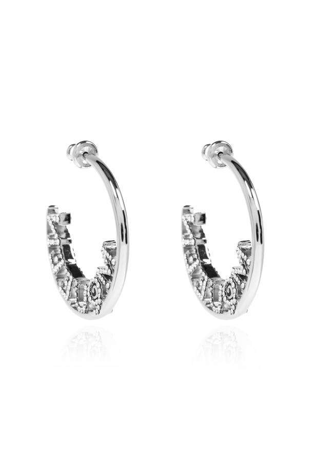 Earrings with a logo encrusted with sparkling crystals od Alexander McQueen