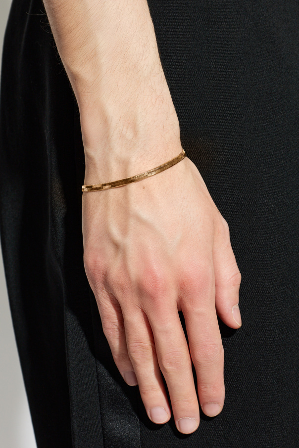 Saint Laurent Brazalete de latón con logo