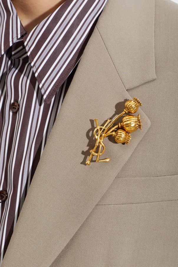 Saint Laurent Brooch in the shape of a logo with a floral motif