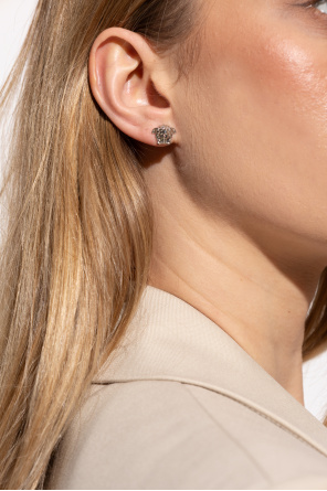 Earrings in the shape of medusa's head od Versace