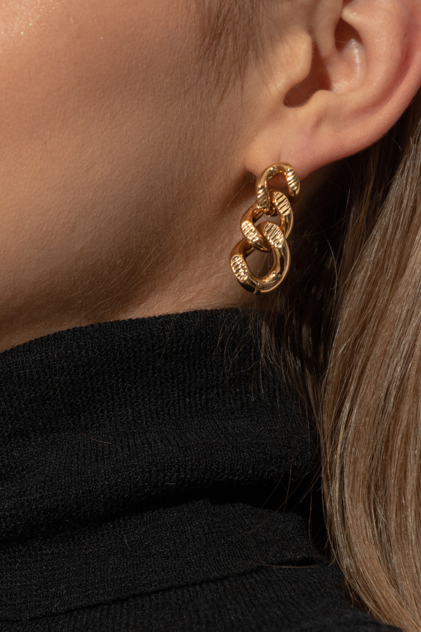 JIL SANDER Brass earrings.