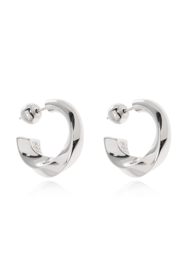 Silver earrings od Jacquemus
