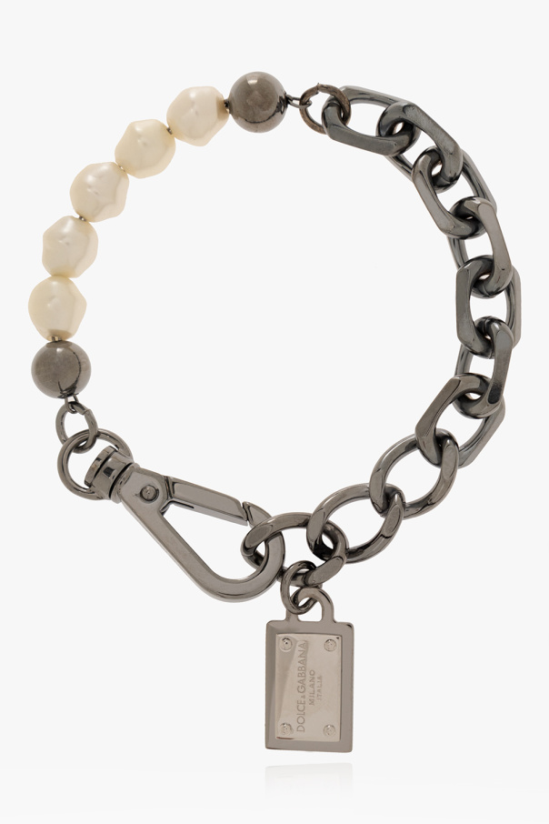 Brass bracelet od Phone motif cufflinks