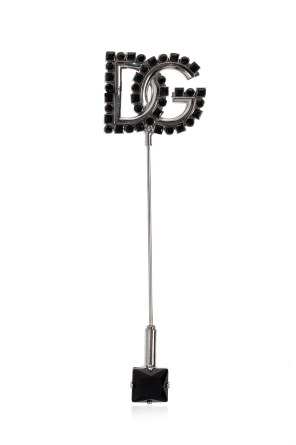 Brooch in the shape of a logo