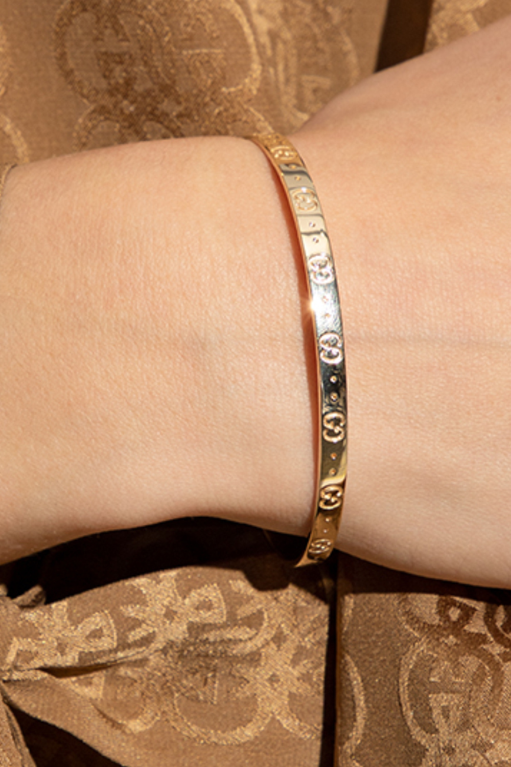 Gucci Gold bracelet with logo