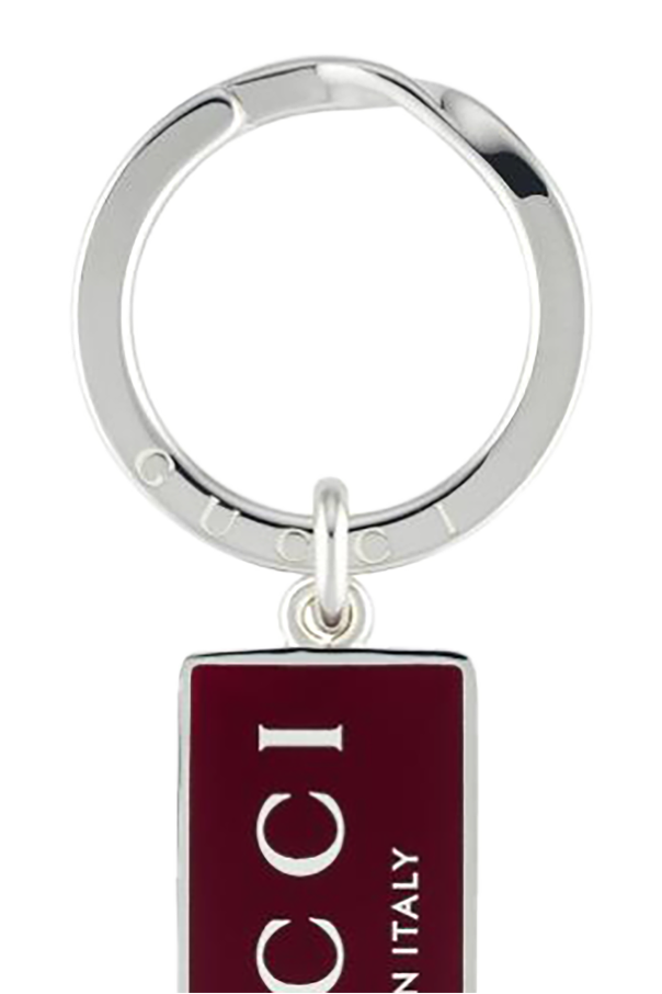 Gucci Llavero plateado con logo