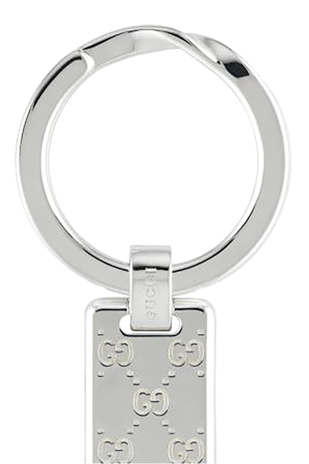 Gucci Llavero plateado con logo