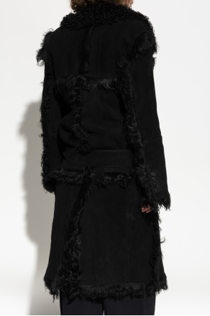 The Attico Shearling coat tied with a belt