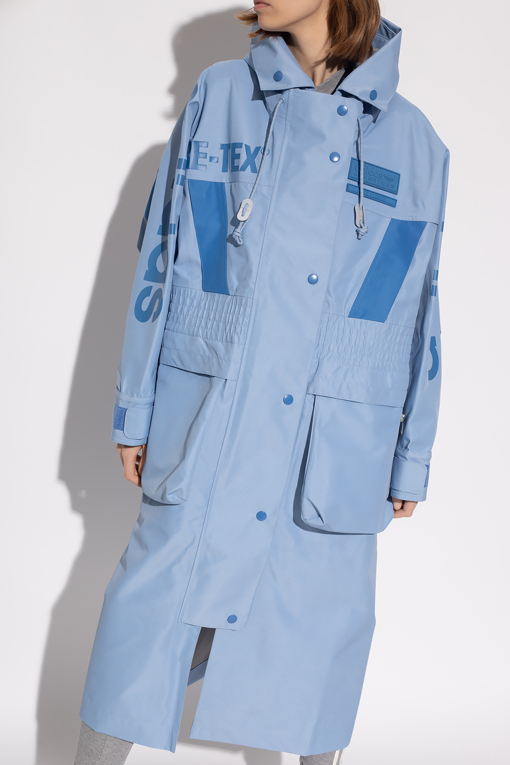 ADIDAS Originals The ‘Blue Version’ collection hooded rain coat