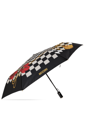 Folding umbrella with floral motif