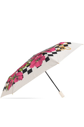 Folding umbrella with floral motif