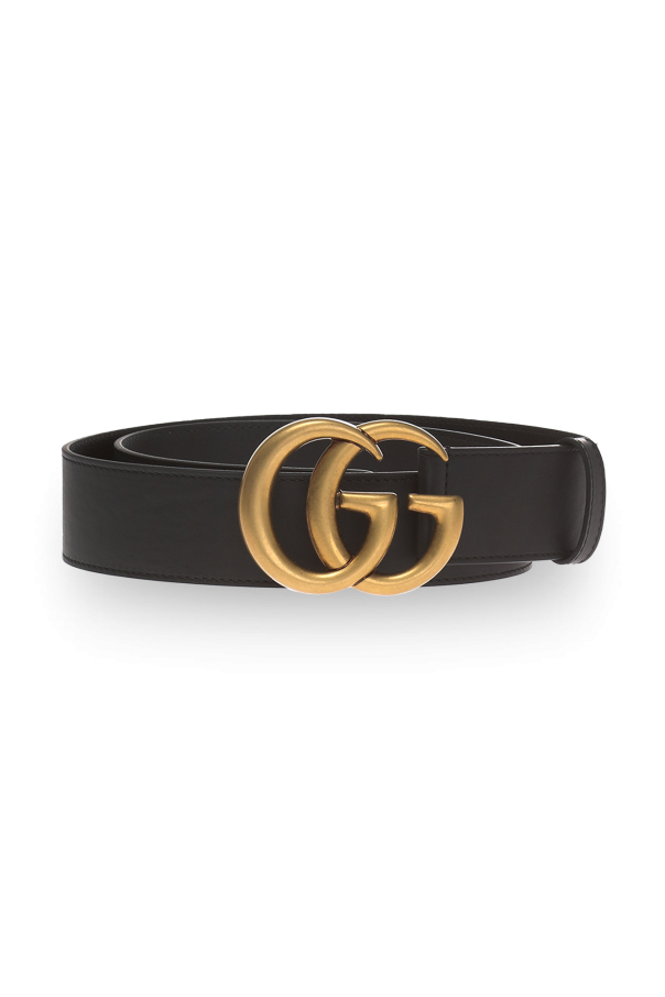 Belt with a decorative buckle od Gucci