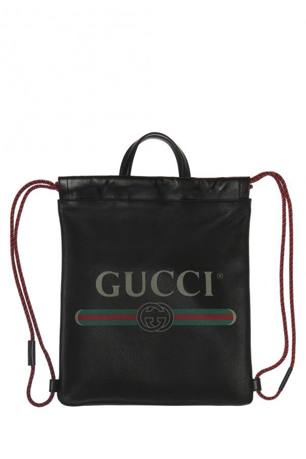 black gucci backpack with red and green stripe