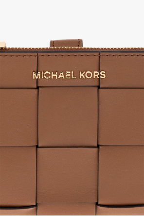 Michael Michael Kors Follow Us: On Various Platforms