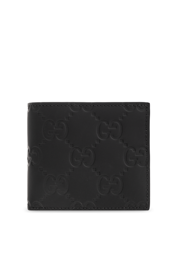 Monogrammed bi-fold wallet od Gucci