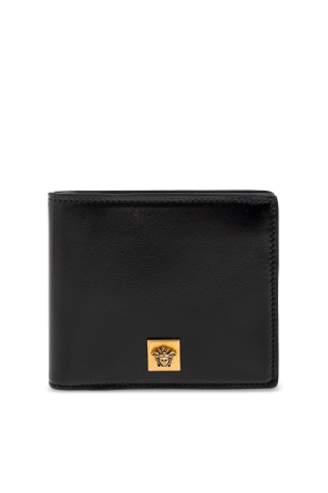 Cartera de cuero con apliques