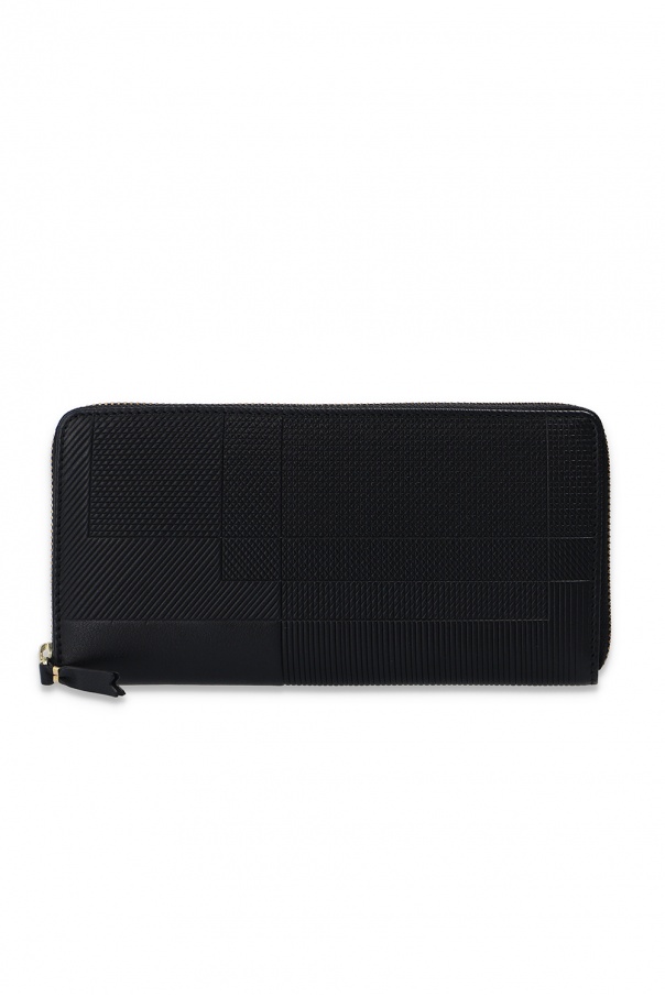 See a unique collaboration with Lacoste which blurs the lines between fashion and sport Leather wallet